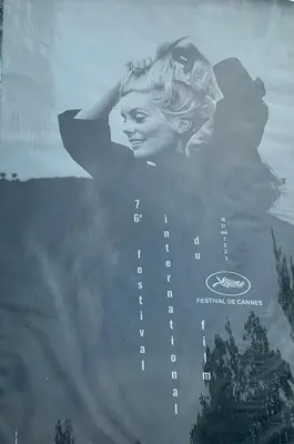 a poster of a woman standing in the clouds at T2 proximité MIPIM in Cannes