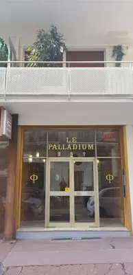 a store front of a building with glass doors at Superbe 2 pièces au calme absolu in Cannes