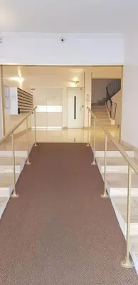 a empty room with stairs in a building at Superbe 2 pièces au calme absolu in Cannes