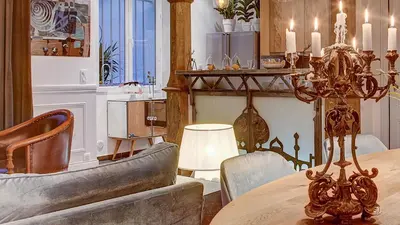 a dining room with a table and chairs at Cocoon in Cannes ***** in Cannes