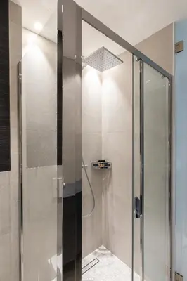 a shower with a glass door in a bathroom at Blue Dreams YourHostHelper in Cannes