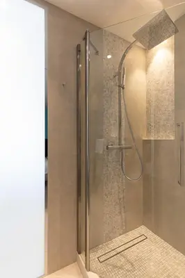 a shower with a glass door in a bathroom at Blue Dreams YourHostHelper in Cannes