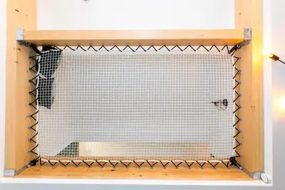 a wire dog cage in a wooden box at Duplex : Plage 300m, Clim, Netflix in Cannes