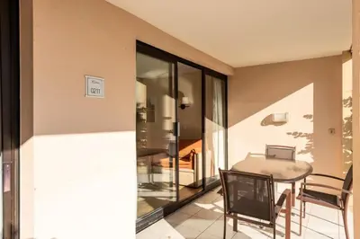 a dining room with a table and chairs at Résidence Cannes Villa Francia - maeva Home - Appartement 3 Pièces 6 Personnes - Confort MAE-6059 in Cannes