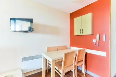 a dining room with a table and chairs at Résidence Cannes Villa Francia - maeva Home - Studio 4 personnes - Sélection MAE-6353 in Cannes