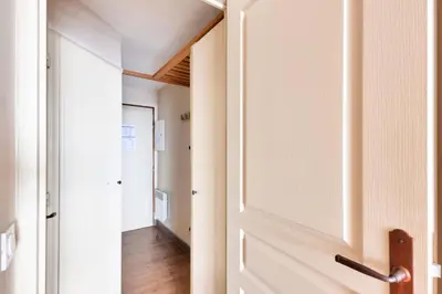 a hallway with a door leading into a room at Résidence Cannes Villa Francia - maeva Home - Studio 4 personnes - Sélection MAE-6353 in Cannes