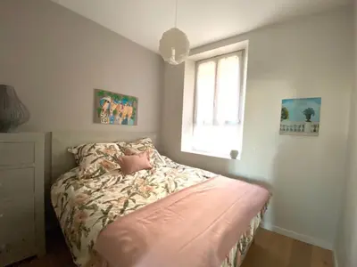 a bedroom with a bed and a window at Cannes Old Port, SEAFRONT & SEAVIEWS new reversible air conditioning in Cannes