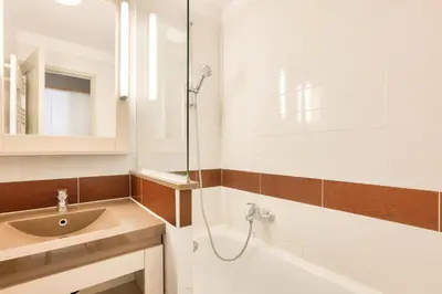 a bathroom with a sink and a shower at Résidence Cannes Villa Francia - maeva Home - Appartement 2 pièces 4 personnes - Sélection MAE-6529 in Cannes