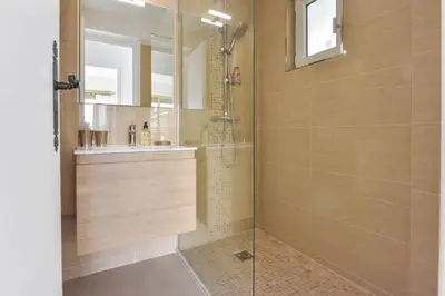 a bathroom with a shower and a sink at Cannes Palm Beach district 2 min to the beaches in Cannes