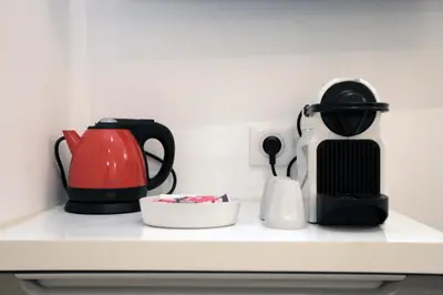 a counter with a coffee maker and a blender at C005-Studette au centre Cannes in Cannes