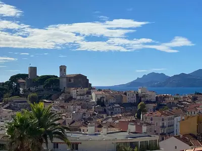 a view of a city with buildings and the ocean at Centre Ville Calme Festivales Plages in Cannes