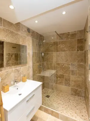a bathroom with a shower and a sink at Le Forville : 400m Palais, Calme, Clim in Cannes