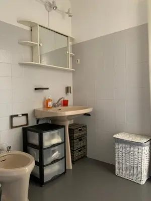 a bathroom with a sink and a toilet at Cannes Standing proche Croisette in Cannes