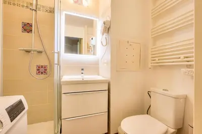 a small bathroom with a toilet and a sink at Résidence Cannes Villa Francia - maeva Home - Appartement 3 pièces 6 personnes - Sélection MAE-8432 in Cannes