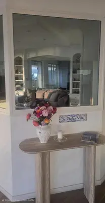 a living room with a view of the ocean at 