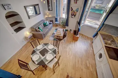 an overhead view of a living room with a table at le Clem - 100m des plages - Suquet - Verrière Côte d’Azur in Cannes
