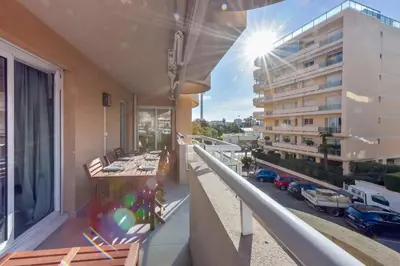a balcony with a view of a building at 3-Br Apartment 3 minutes to the Croisette in Cannes