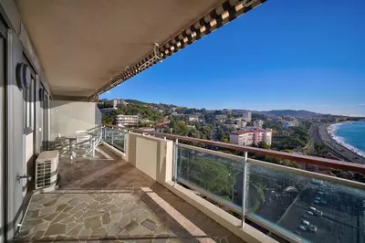 a balcony of a house with a view of the ocean at IMMOGROOM- Incredible View -4- Big Terrace - AC - Parking in Cannes