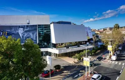 a large building with a large ad on the side of it at LEM5D - Palmes d'Or Properties in Cannes