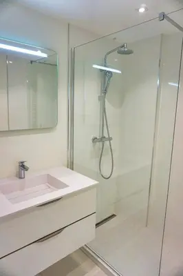 a bathroom with a sink and a shower at LEM5F - Palmes d'Or Properties in Cannes