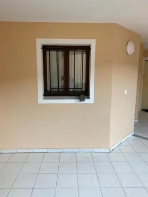 a window on a wall with a tile floor at Résidence La Palme d'Azur - Petersen App 610 in Cannes