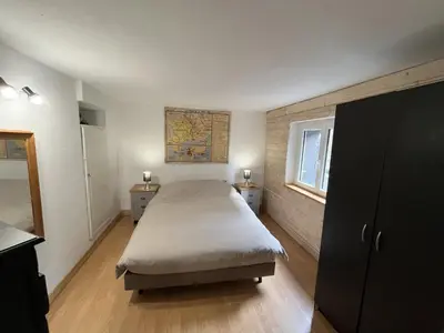 a bedroom with a large bed and a window at Cannes Charming Villa Private Pool near beaches new award 10 out of 10 in Le Cannet
