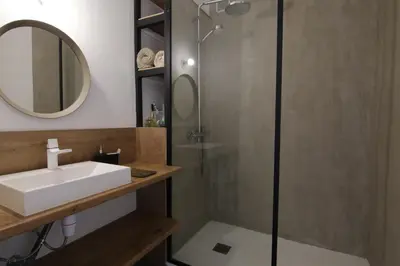 a bathroom with a sink and a shower at Sunset Loft in Cannes