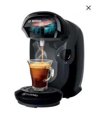 a coffee maker is making a cup of coffee at Red Calmette in Cannes