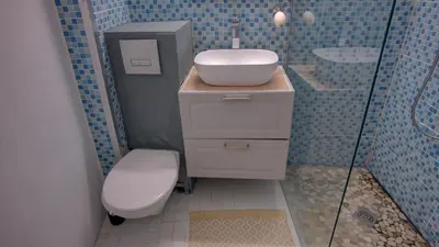a bathroom with a toilet and a sink and a shower at Les Tambourins Studio 19 - 3 étoiles in Cannes