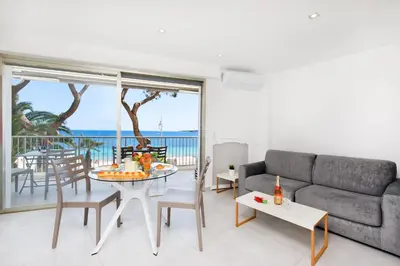 a living room with a couch and a table at Fettolina in Cannes