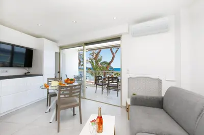 a living room with a couch and a table at Fettolina in Cannes