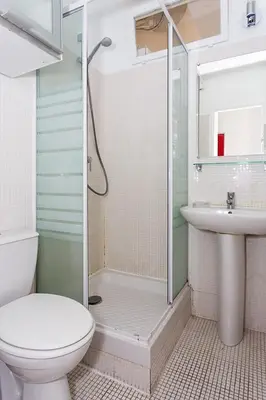 a bathroom with a shower and a toilet and a sink at 1 bedroom appartement Cannes (Carnot) in Cannes