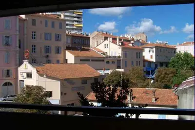 a view from a window of a city with buildings at Comfortable Flat With Balcony Cannes City Centre in Cannes