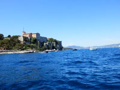 a large body of water with a island in the middle at Esterel Terrasses, roof top front de mer, parking payant in Cannes