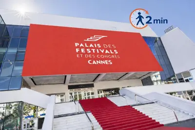 a building with a red sign on it with red stairs at Cannes CROISETTE, Palais des Festivals, Beaches, Apart Residence Le MINERVE in Cannes
