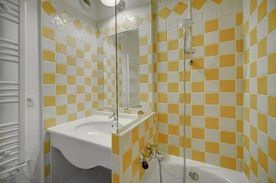 a bathroom with a sink and a shower and a tub at IMMOGROOM - 2 Rooms - Renovated - Pool - Air conditioning - Parking - Wifi in Cannes
