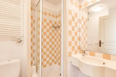 a bathroom with a shower and a sink and a toilet at Résidence Cannes Villa Francia - maeva Home - Appartement 3 Pièces 6 Personnes - Confort MAE-7944 in Cannes