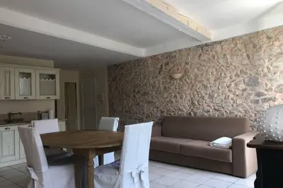 a living room with a couch and a table at C054-Bel Appartement Lumineux au Coeur du Suquet in Cannes