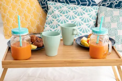 a tray with two cups and a plate of juice at Superbes studios entièrement rénovés - 50m croisette in Cannes