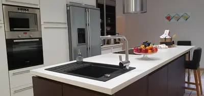 a kitchen with a sink and a counter top at Villa Terra by Festif Azur - House 250m2 Quiet, 5 min walk from Palais des Festivals and Beaches in Cannes