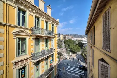 a view of a street between two buildings at IMMOGROOM - Splendid Terrace - Studio - Central in Cannes