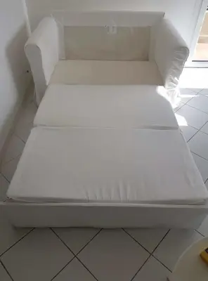 a white bed sitting on top of a floor at C060-Bel Appartement avec Vue Mer - Picaud in Cannes