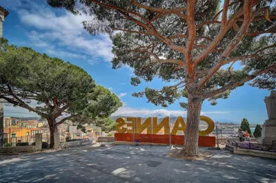 a sign that reads santa ana with trees and buildings at IMMOGROOM - 5 min from beaches - Suquet - AC in Cannes
