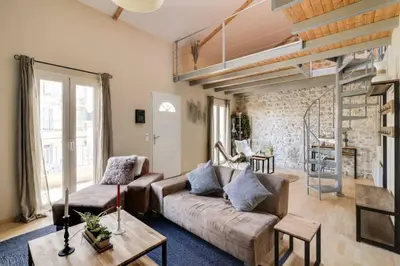 a living room with a couch and a table at C059-Splendid apartment with air conditioned - Cannes in Cannes