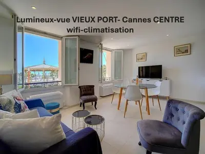 a living room with a couch and chairs and a table at Chic 2 chambres vue PORT, FELIX FAURE-COEUR DE CANNES A2B218 in Cannes