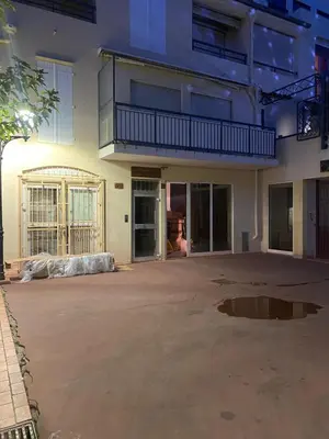 an empty parking lot in front of a building at Duplex 2 chambres TERRASSE, MEYNADIER- FORVILLE A2B103 in Cannes