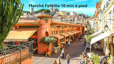 a view of a street in a city with people walking at Spacieux 2 chambres TERRASSE, CANNES CENTRE A2B067 in Cannes