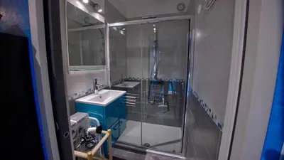 a bathroom with a glass shower and a sink at 3 StarsStudio54 23 Ave Laugier100m Plages Mistral in Cannes