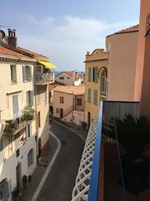 a view of a street from a balcony of a building at les terrasses du Suquet in Cannes