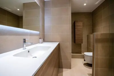 a bathroom with a sink and a toilet at 2-Bedroom apartment in Grand Hotel in Cannes